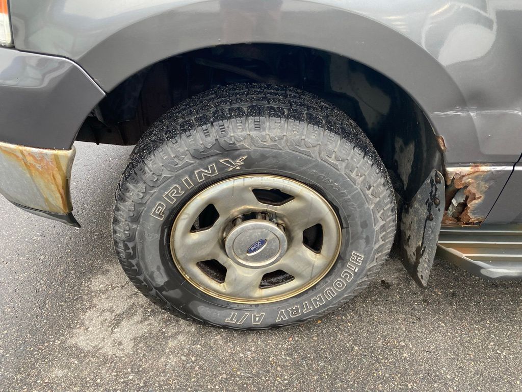 Used 2004 Ford F-150 XLT with VIN 1FTRW14WX4KC21660 for sale in Hibbing, Minnesota