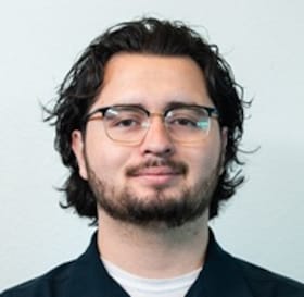 Staff member Damone Aguirre from 9ce64ec7f79d