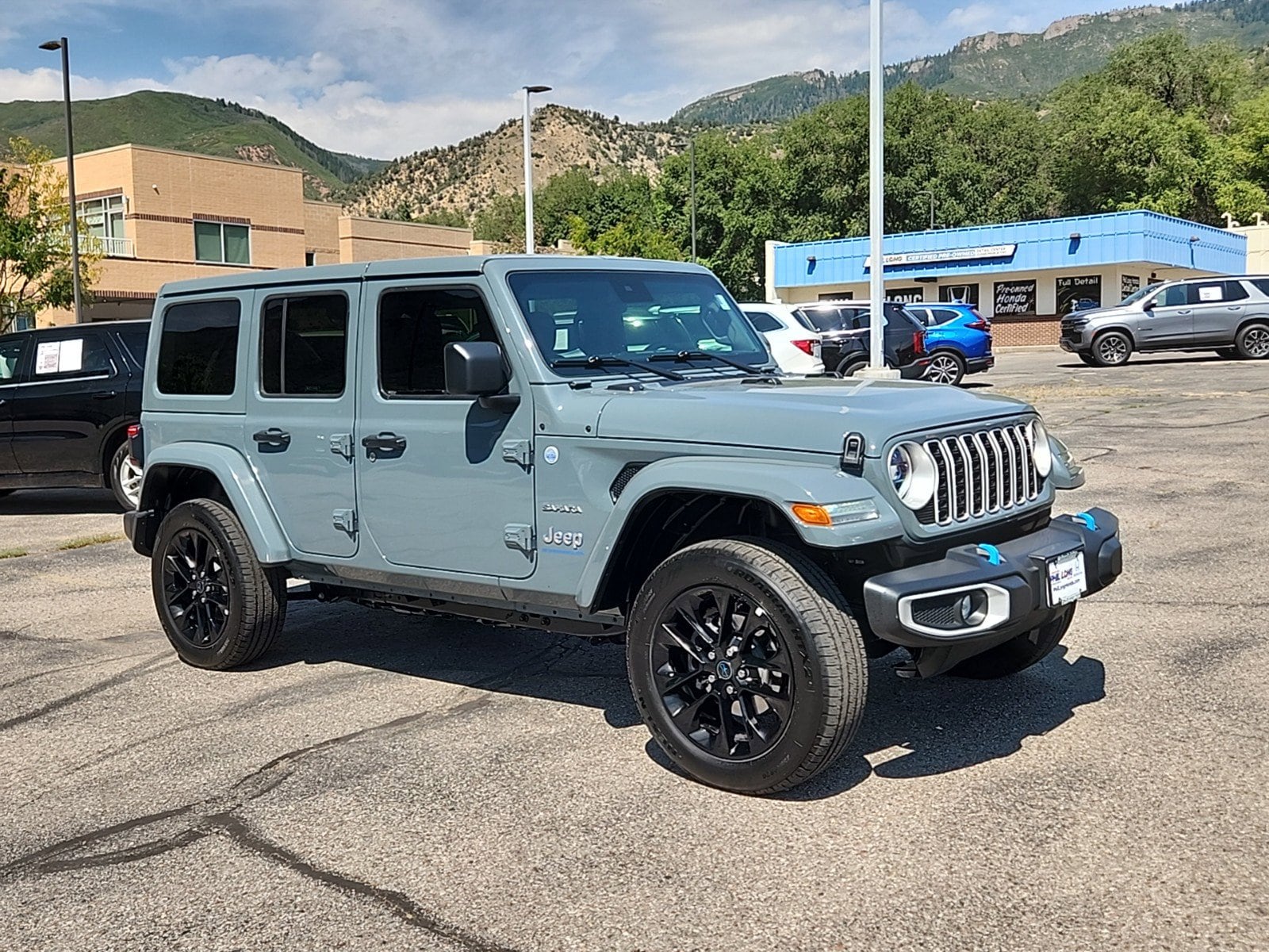 Used 2024 Jeep Wrangler 4xe Sahara 4XE with VIN 1C4RJXP65RW233213 for sale in Glenwood Springs, CO