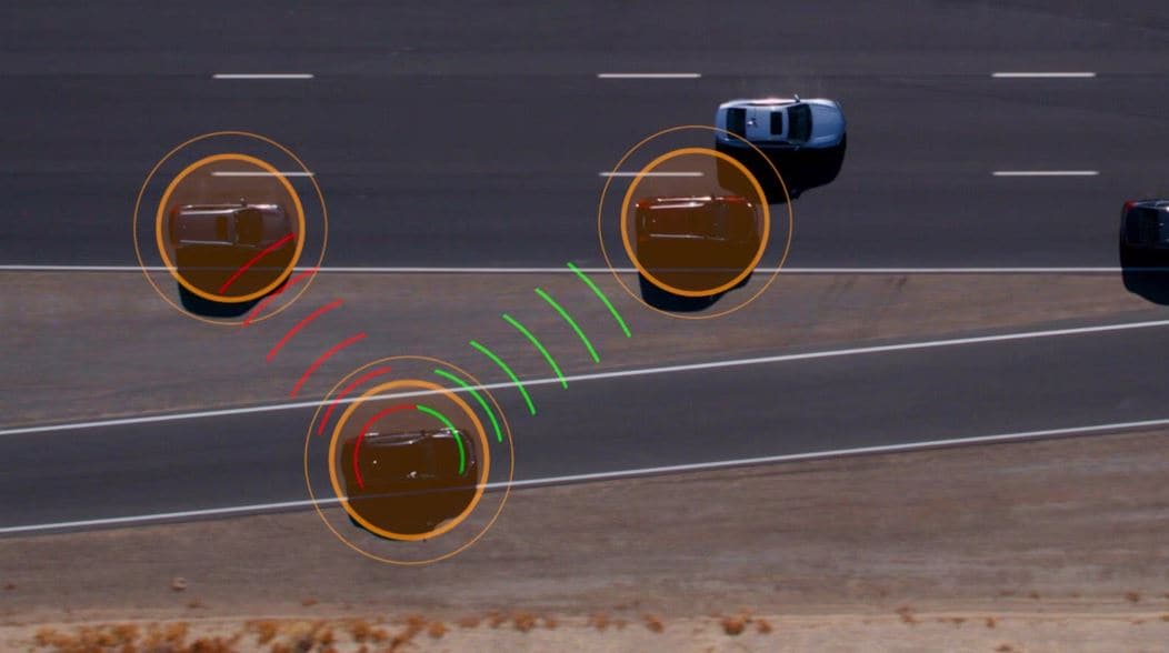 A Honda vehicle utilizing its sensing technology to identify other vehicles on the road.