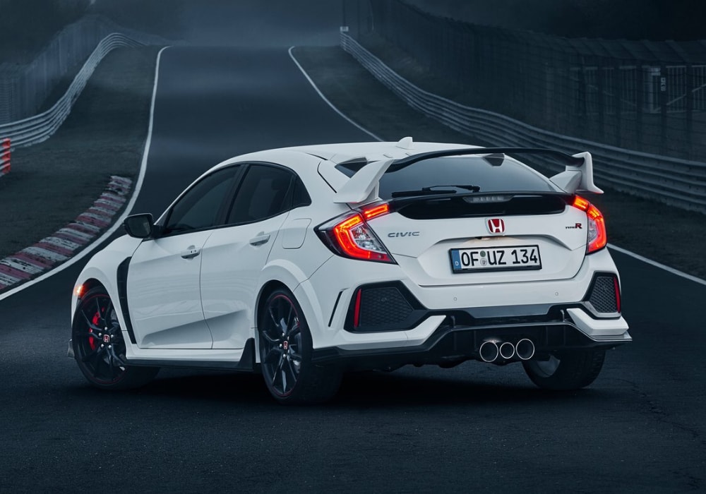 2020 Honda Civic Type R rear exterior design showing the trifecta exhaust pipes system