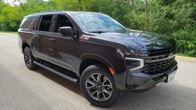 Used 2023 Chevrolet Suburban Z71 with VIN 1GNSKDKD8PR122841 for sale in Highland Park, IL