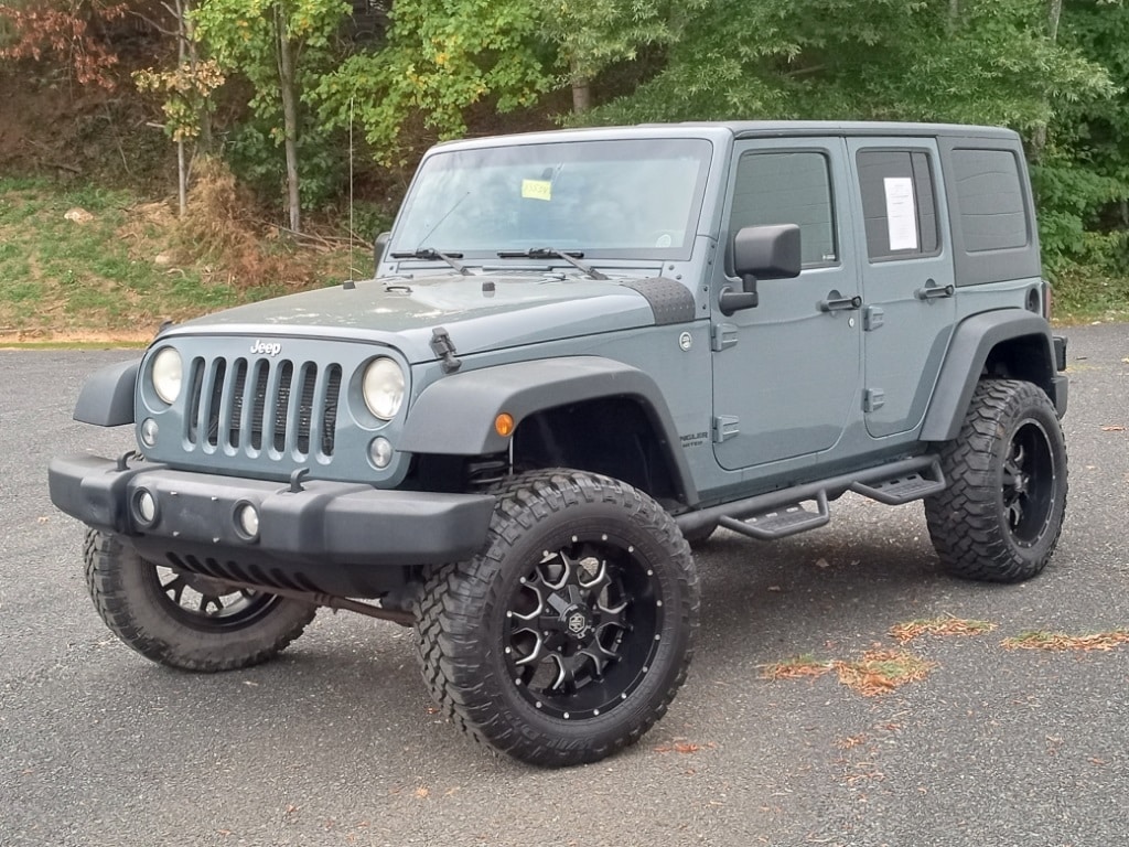 Used 2014 Jeep Wrangler Unlimited Sport with VIN 1C4BJWDG2EL225879 for sale in High Point, NC