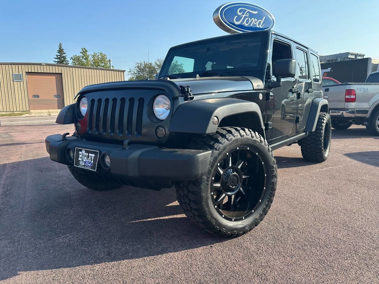 Used 2010 Jeep Wrangler Unlimited Rubicon with VIN 1J4BA6H19AL122436 for sale in Windom, Minnesota