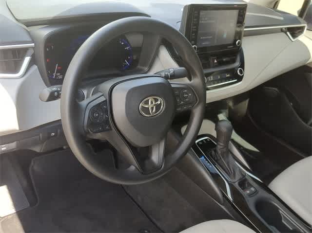 Used 2022 Toyota Corolla LE with VIN JTDEAMDE1NJ061097 for sale in San Antonio, TX