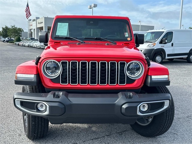 Used 2025 Jeep Wrangler 4-Door Sahara with VIN 1C4PJXEN7SW563524 for sale in Pensacola, FL