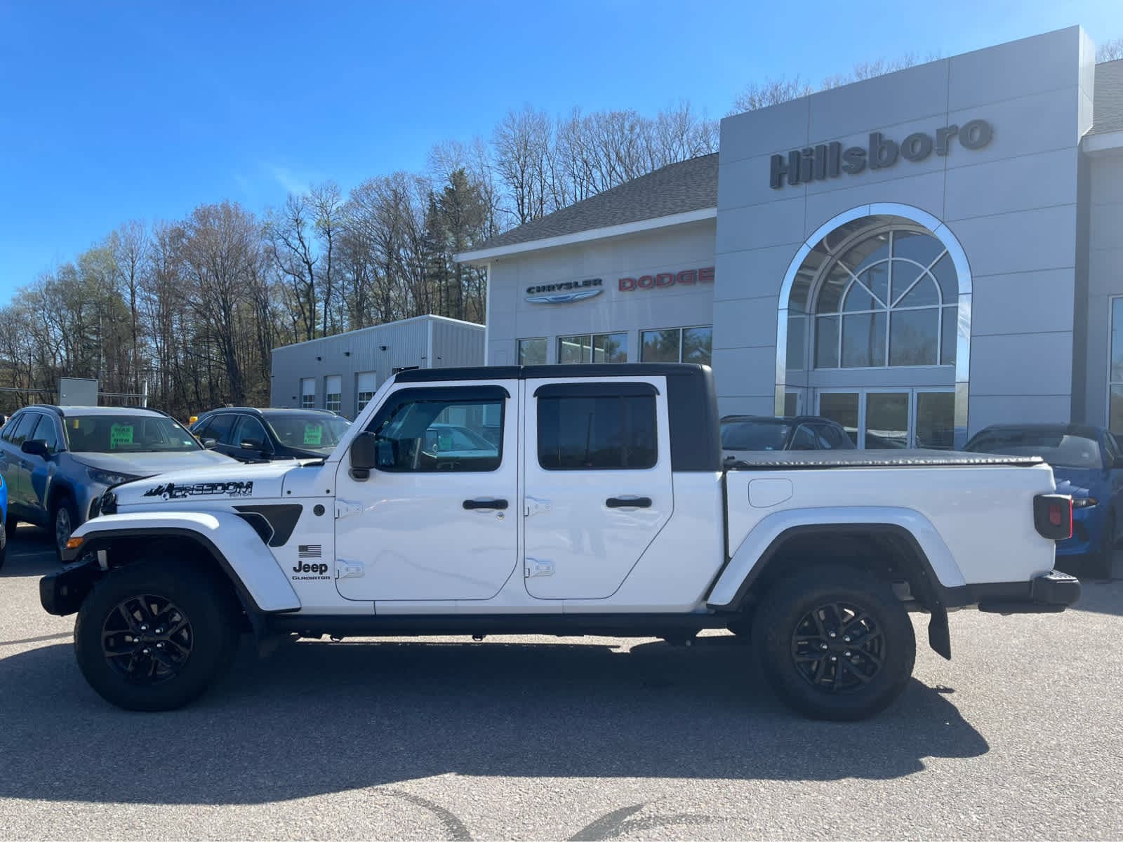 Used 2023 Jeep Gladiator Freedom with VIN 1C6HJTAG7PL513288 for sale in Hillsboro, NH