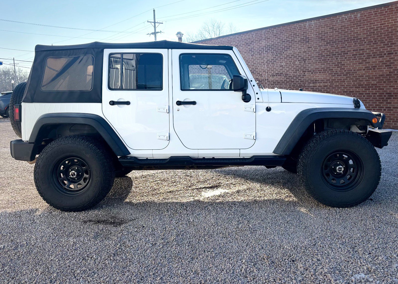 Used 2016 Jeep Wrangler Unlimited Sahara with VIN 1C4BJWEG0GL210928 for sale in Hillsboro, KS