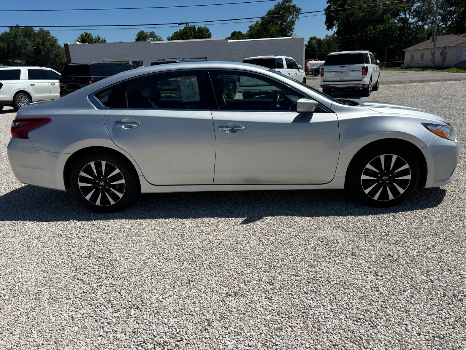 Used 2018 Nissan Altima SV with VIN 1N4AL3AP7JC254349 for sale in Hillsboro, KS