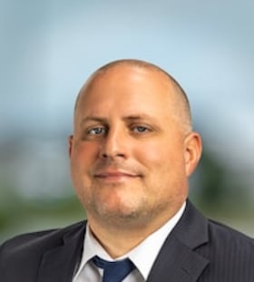 Staff member Adam Brown from ID_27320b4993bd