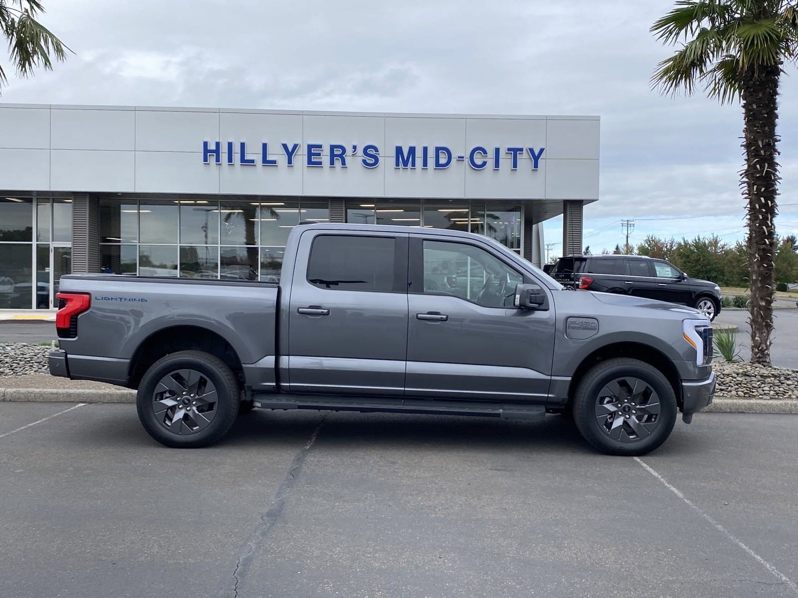 Used 2022 Ford F-150 Lightning Lariat with VIN 1FT6W1EV5NWG10788 for sale in Woodburn, OR