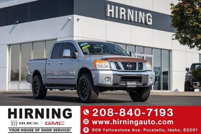 Silver 2011 Nissan Titan Pickup Truck Four-Wheel Drive Automatic