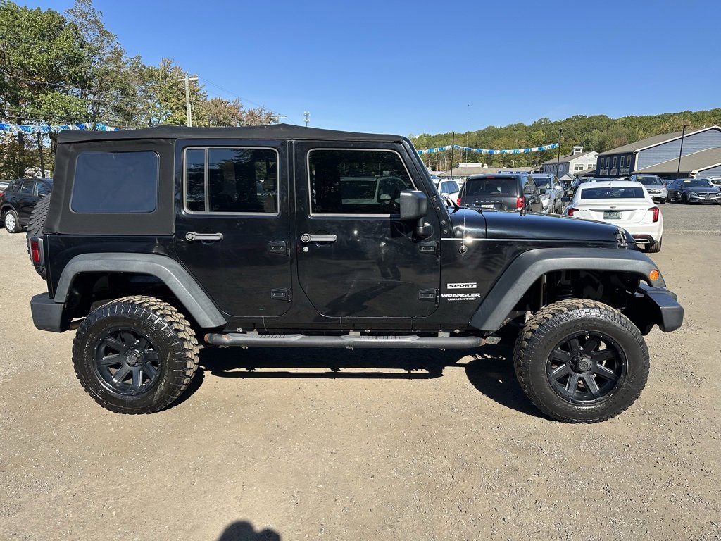 2016 Jeep Wrangler Unlimited Sport photo 2