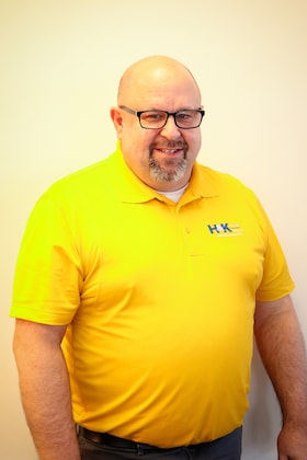 Staff member Adam Robison from ID_e0bbe641d783