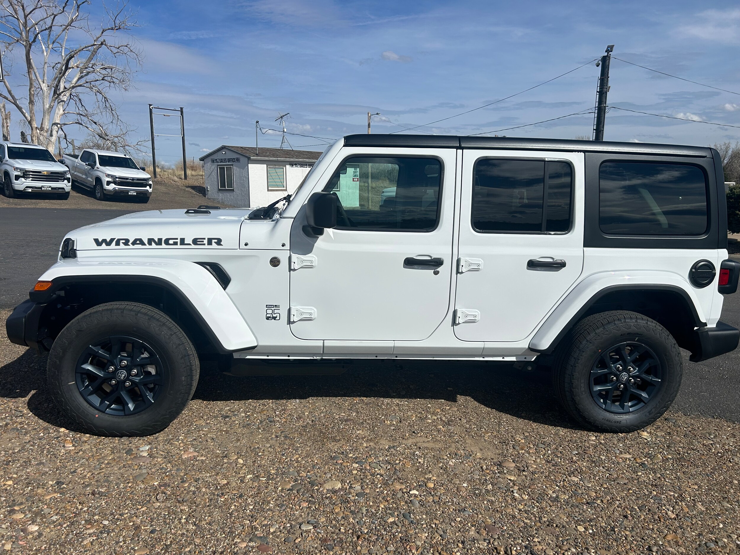 2026 Jeep Wrangler 4-DOOR 85TH ANNIVERSARY EDITION - Bright White Clear-Coat Paint exterior view 3