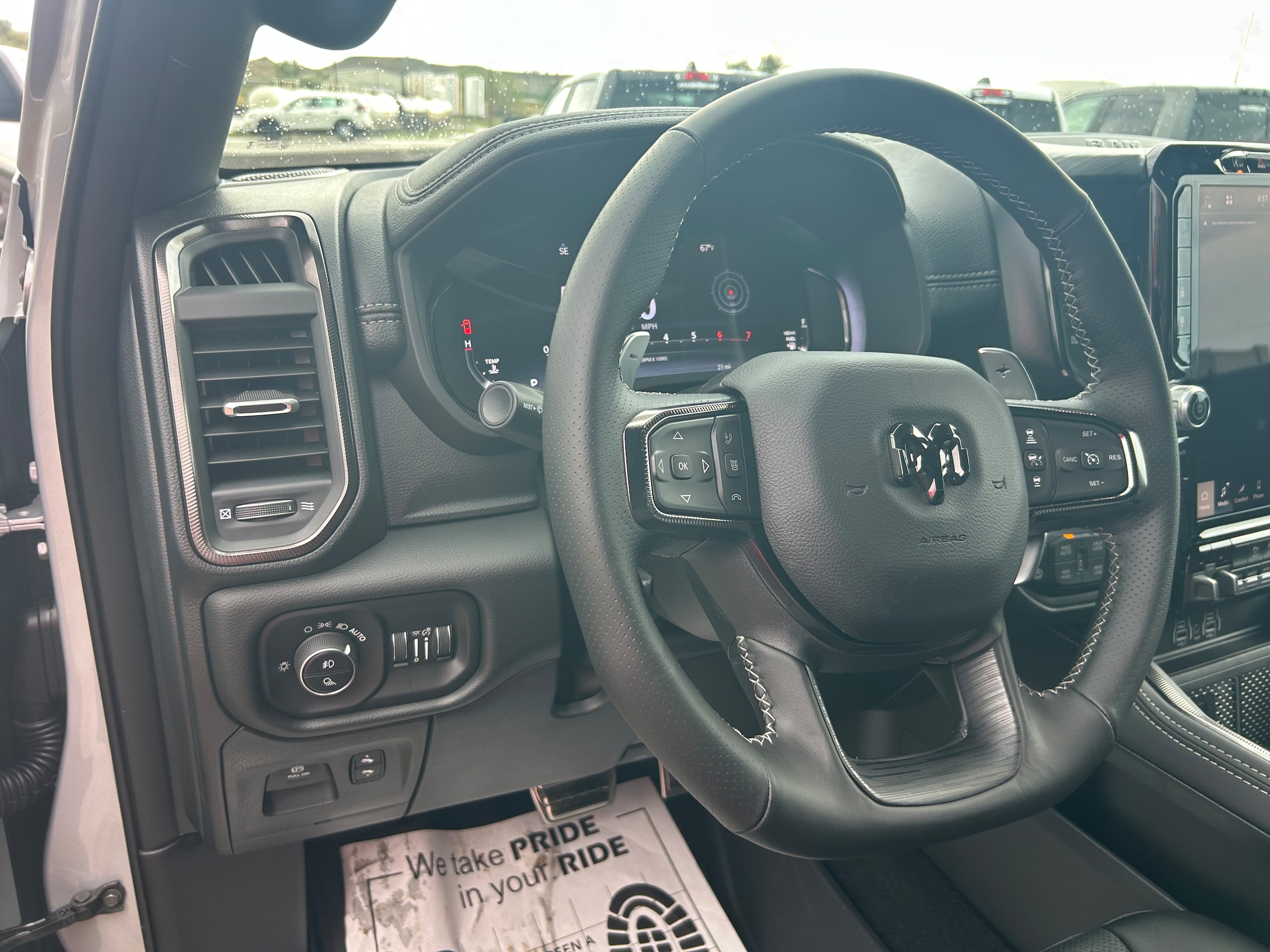 2026 Ram 1500 RHO CREW CAB 4X4 5'7 BOX - Silver Zynith Paint exterior view 11