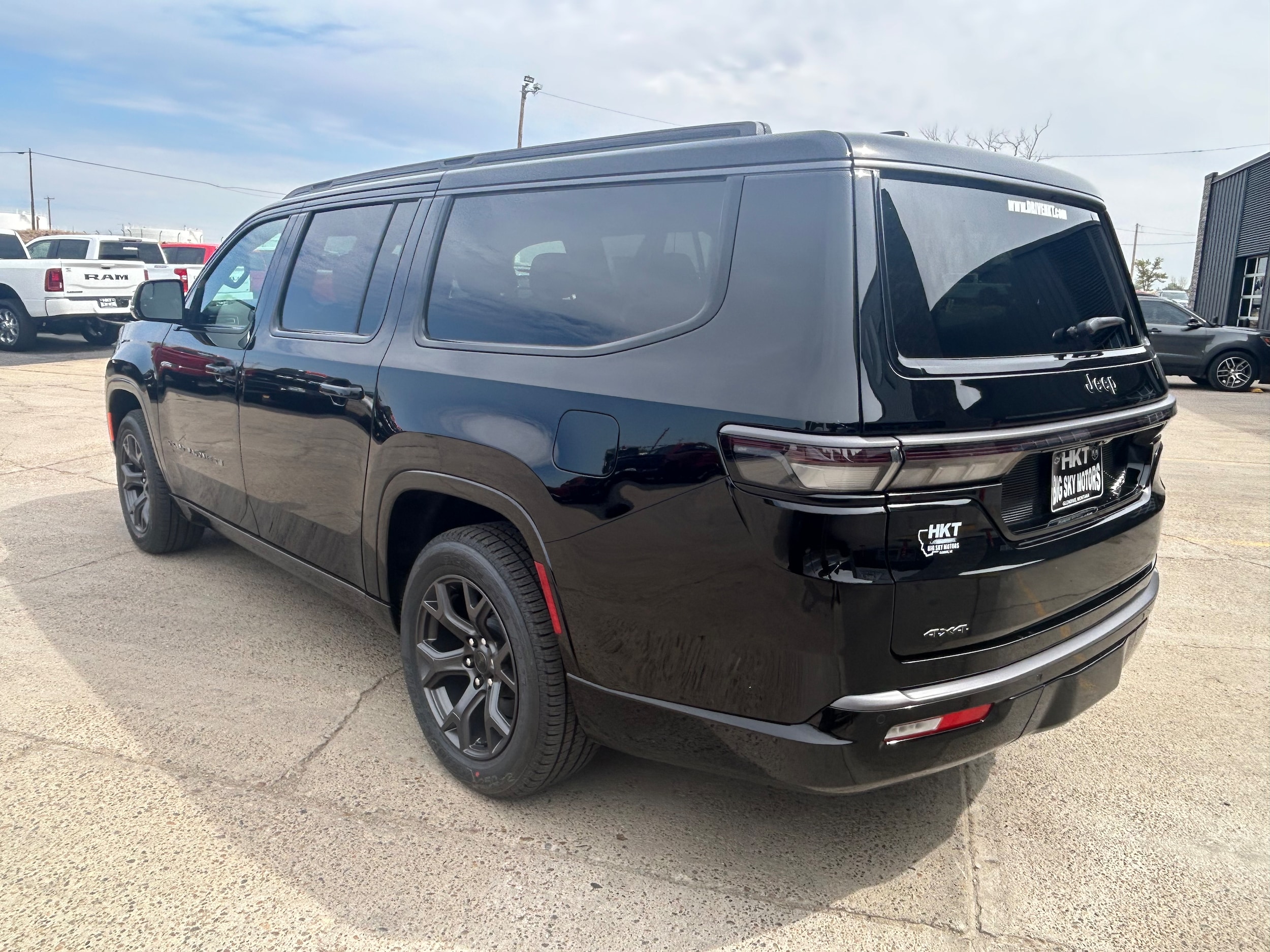 2026 Jeep Grand Wagoneer L LIMITED ALTITUDE 4X4 - High Gloss Black exterior view 3