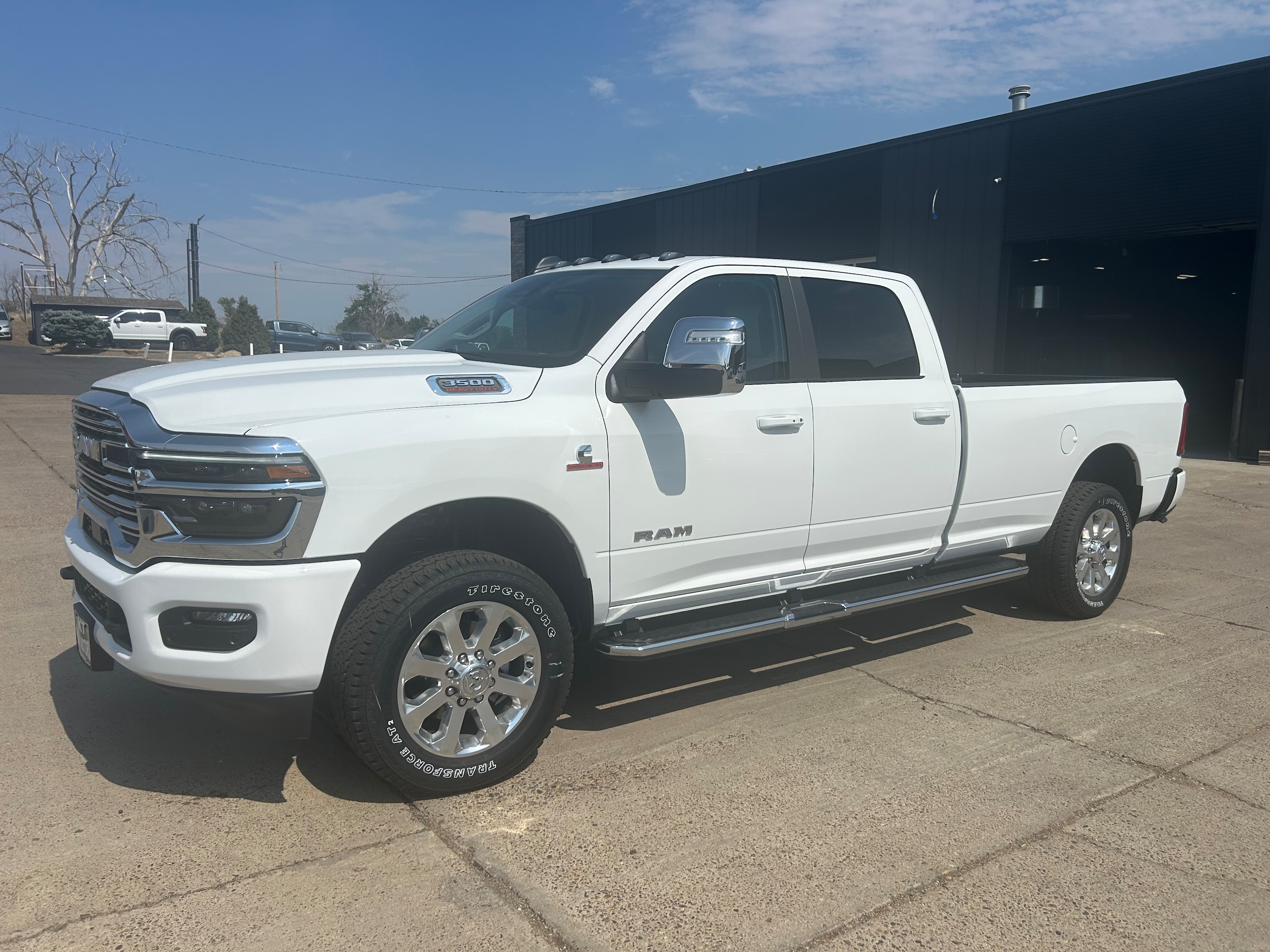 2026 Ram 3500 LARAMIE CREW CAB 4X4 8' BOX - Bright White Clear-Coat Paint exterior view 2