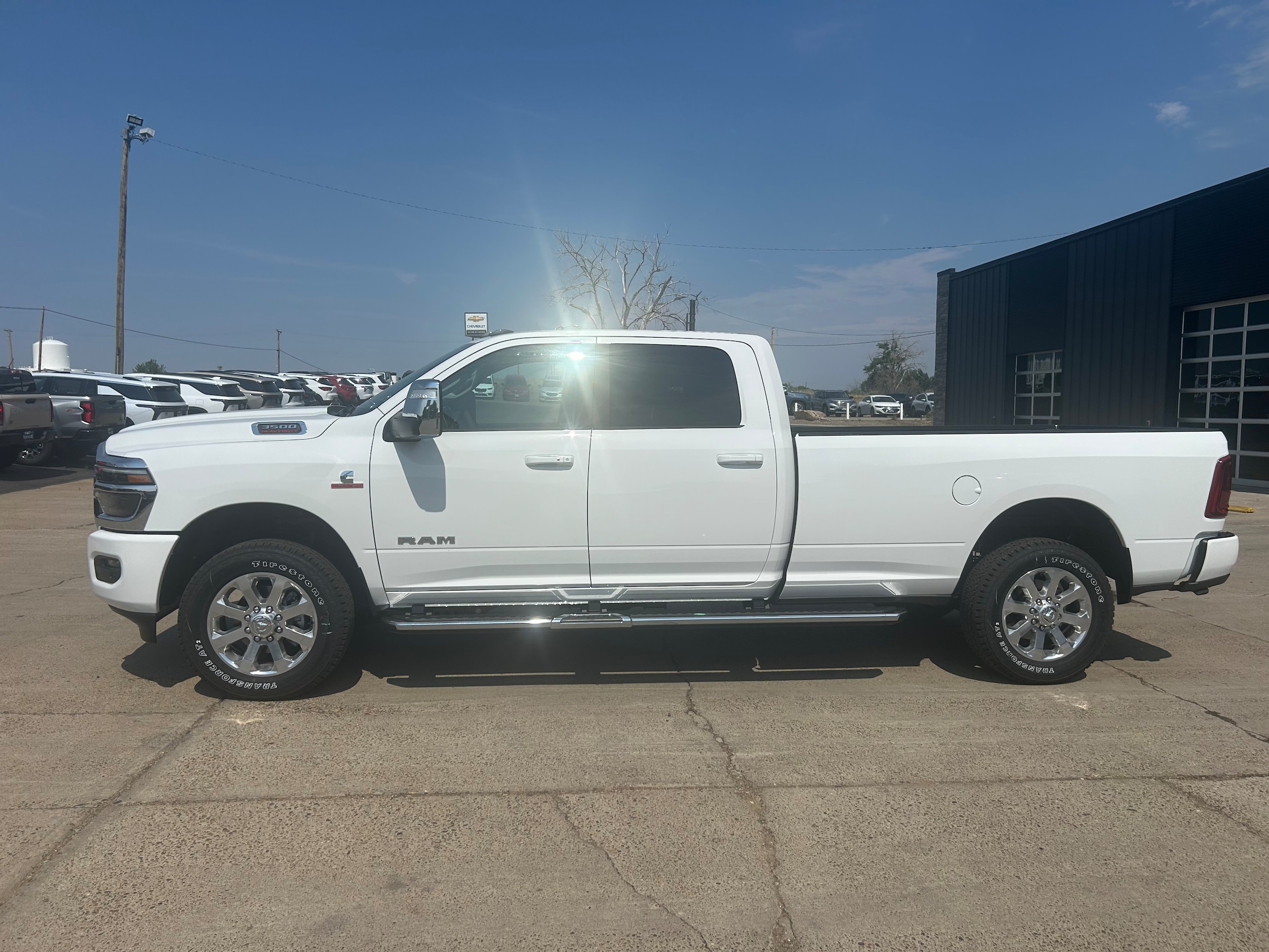 2026 Ram 3500 LARAMIE CREW CAB 4X4 8' BOX - Bright White Clear-Coat Paint exterior view 3