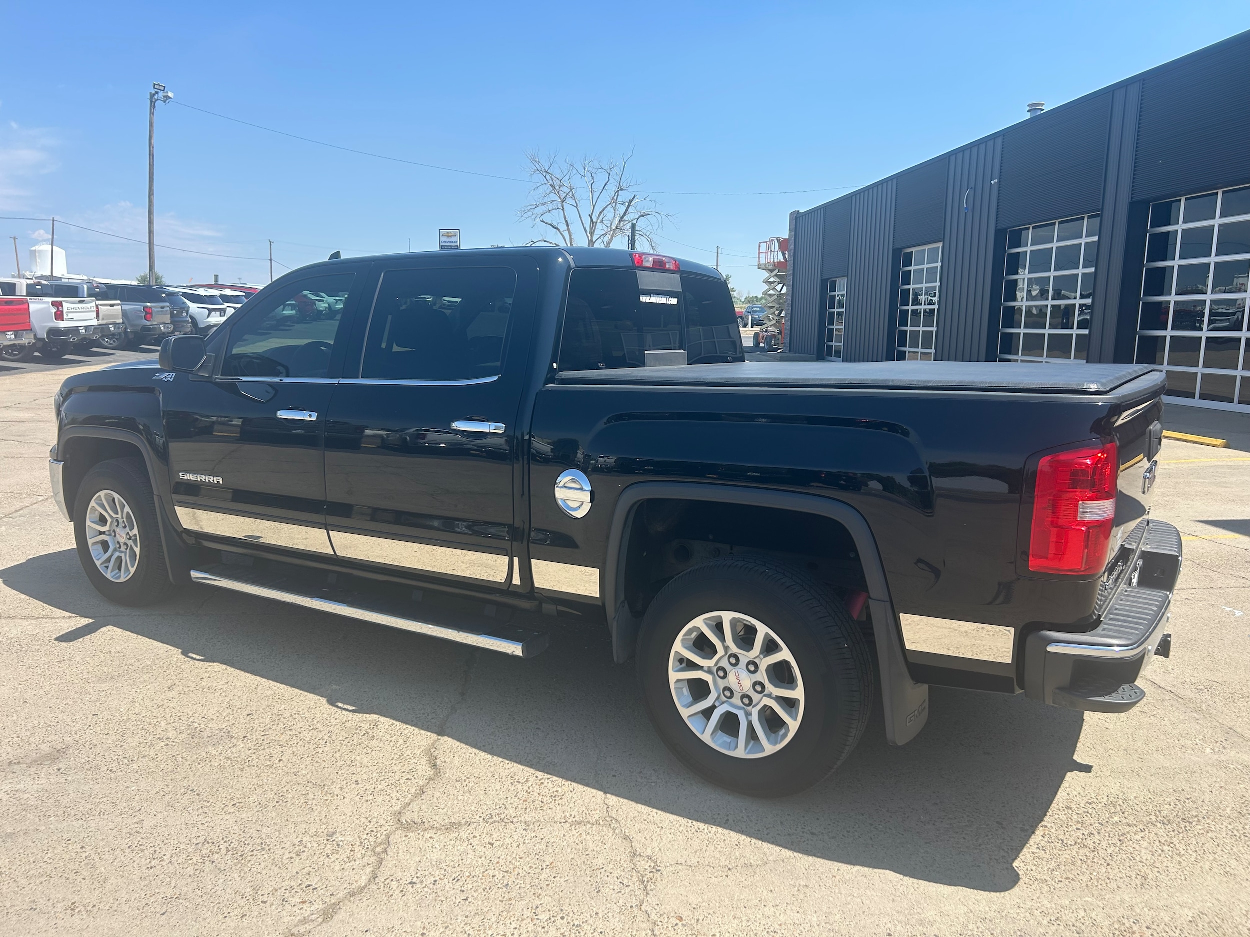 2016 GMC Sierra 1500 SLE - Onyx Black exterior view 3