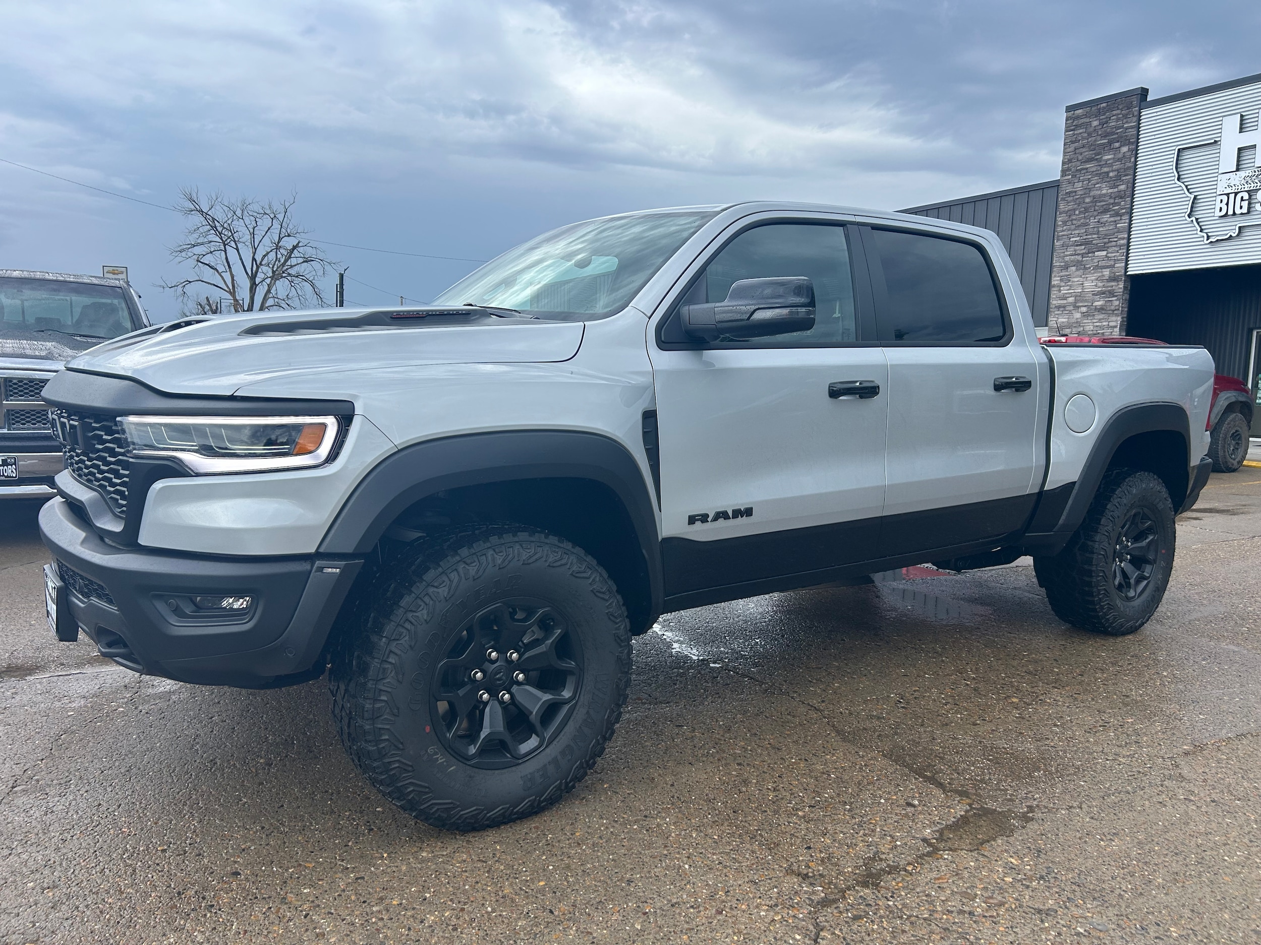 2026 Ram 1500 RHO CREW CAB 4X4 5'7 BOX - Silver Zynith Paint exterior view 2