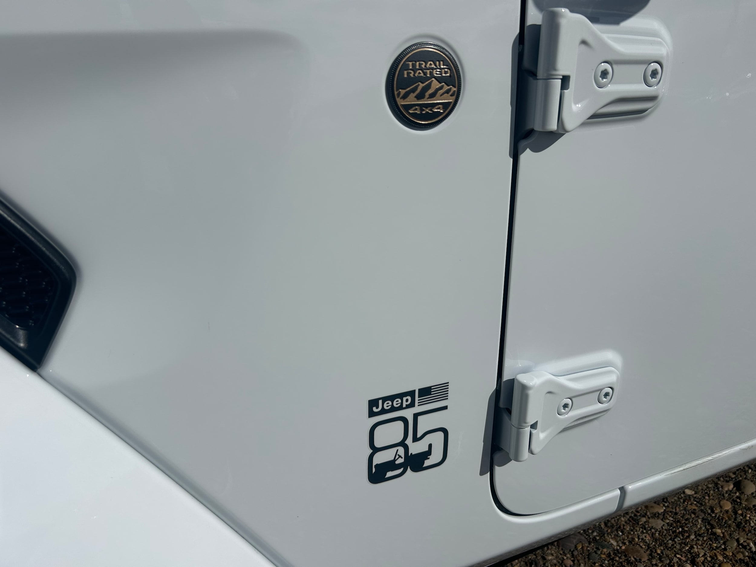 2026 Jeep Wrangler 4-DOOR 85TH ANNIVERSARY EDITION - Bright White Clear-Coat  Paint exterior view 11