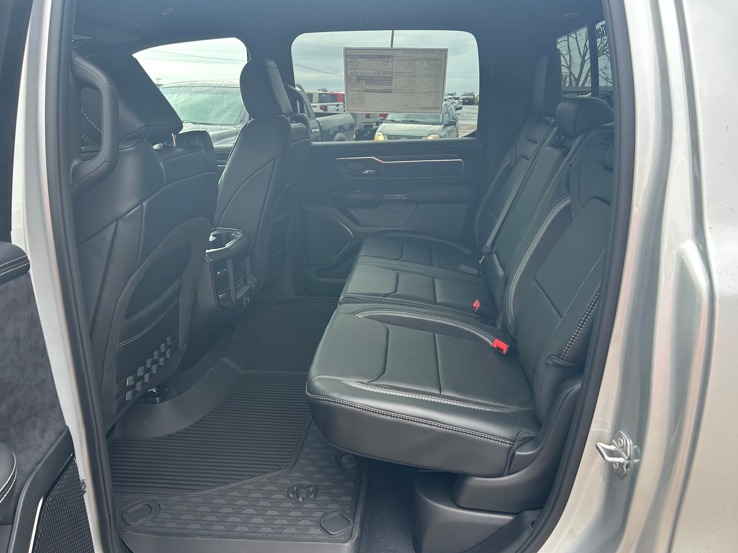 2026 Ram 1500 RHO CREW CAB 4X4 5'7 BOX - Silver Zynith Paint exterior view 9