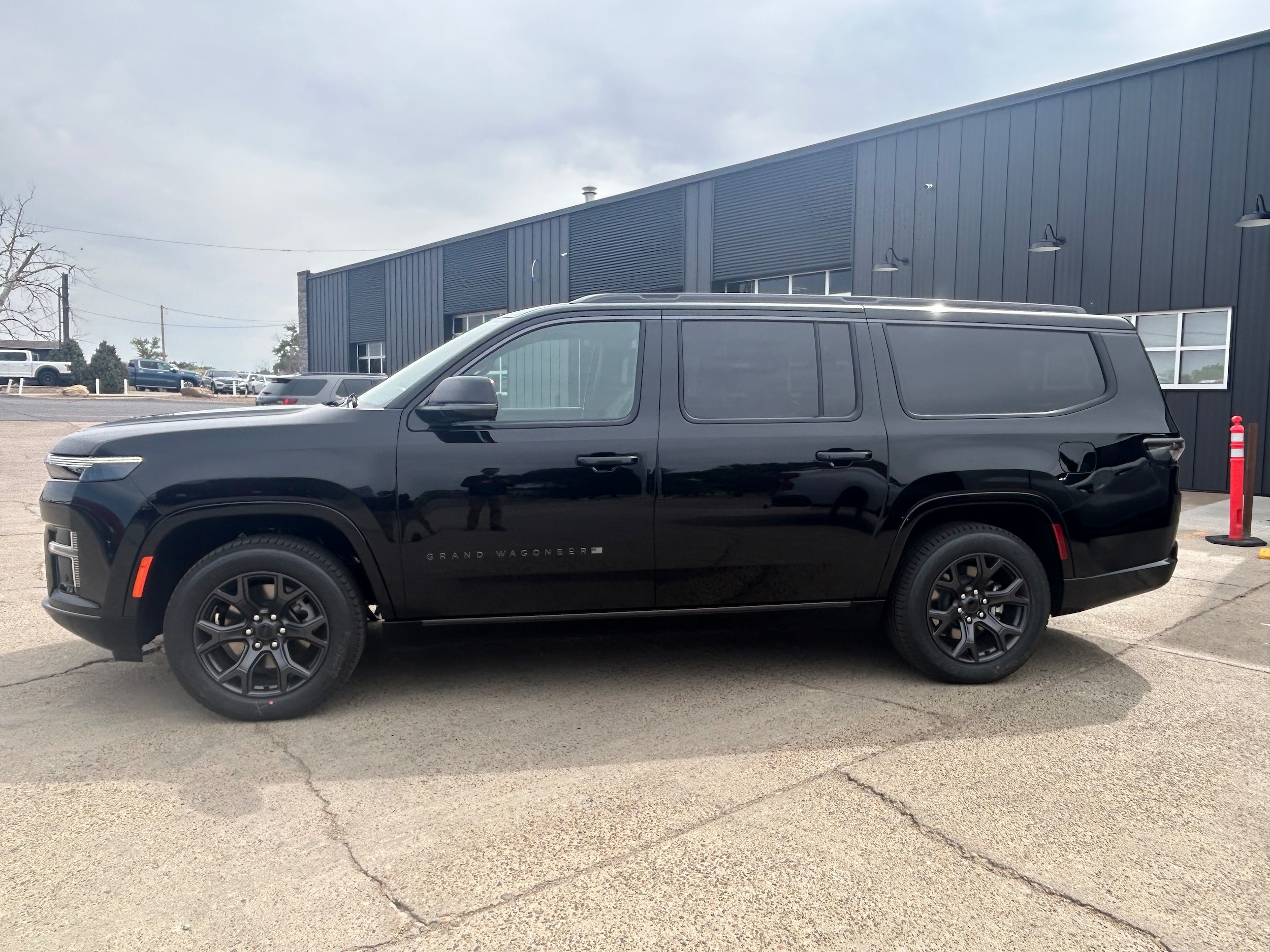2026 Jeep Grand Wagoneer L LIMITED ALTITUDE 4X4 - High Gloss Black exterior view 2