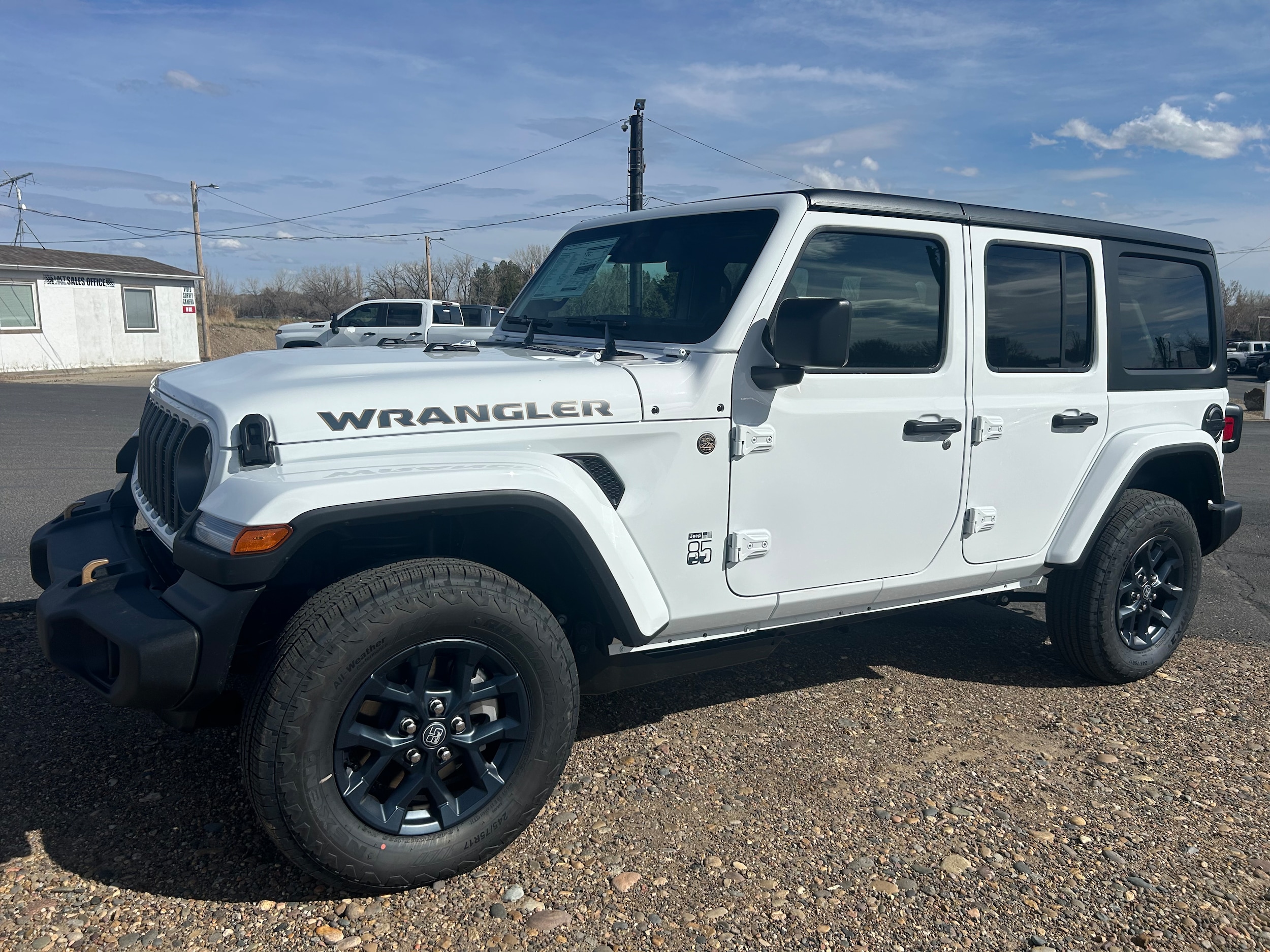 2026 Jeep Wrangler 4-DOOR 85TH ANNIVERSARY EDITION - Bright White Clear-Coat Paint exterior view 2