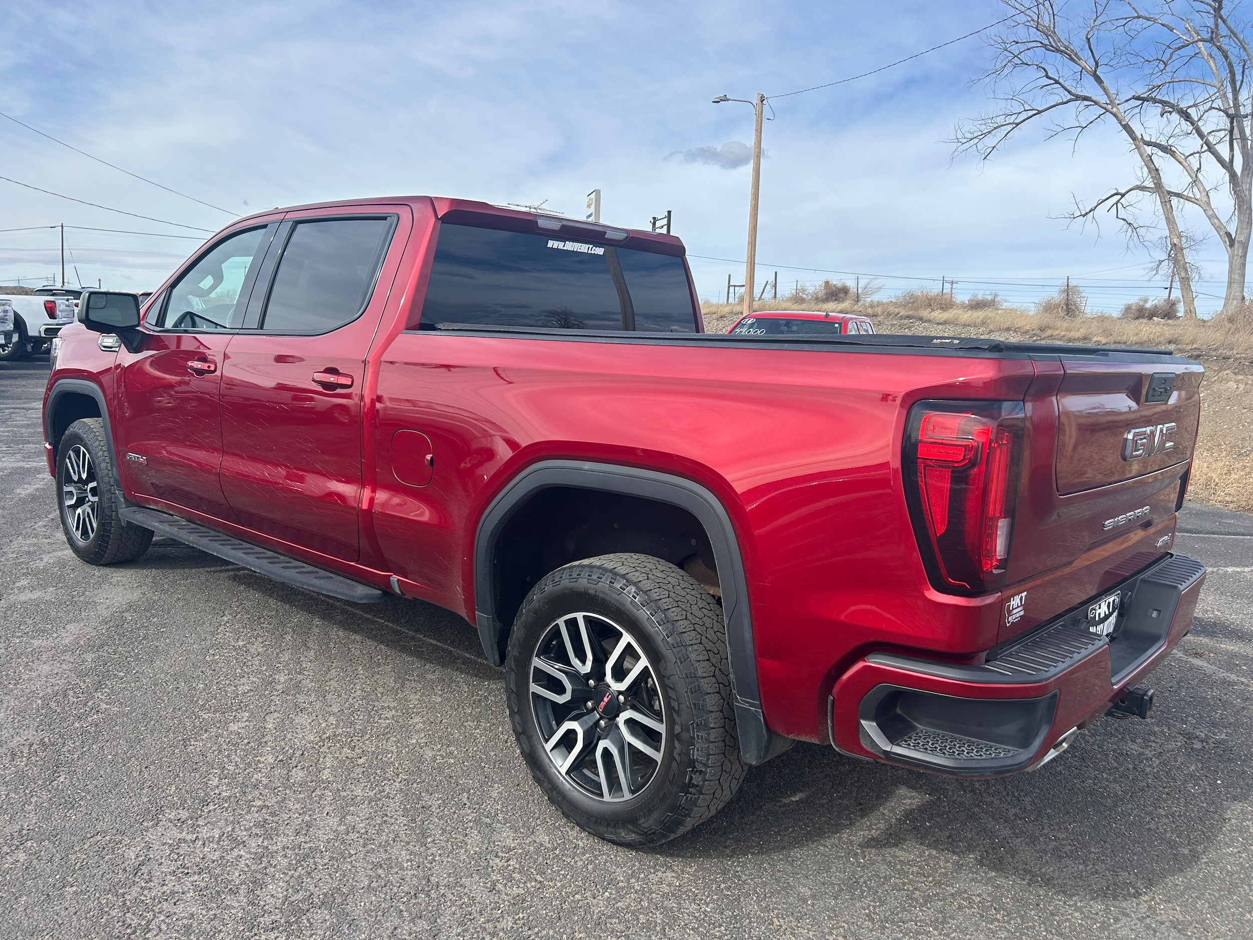 2021 GMC Sierra 1500 AT4 - Red exterior view 3