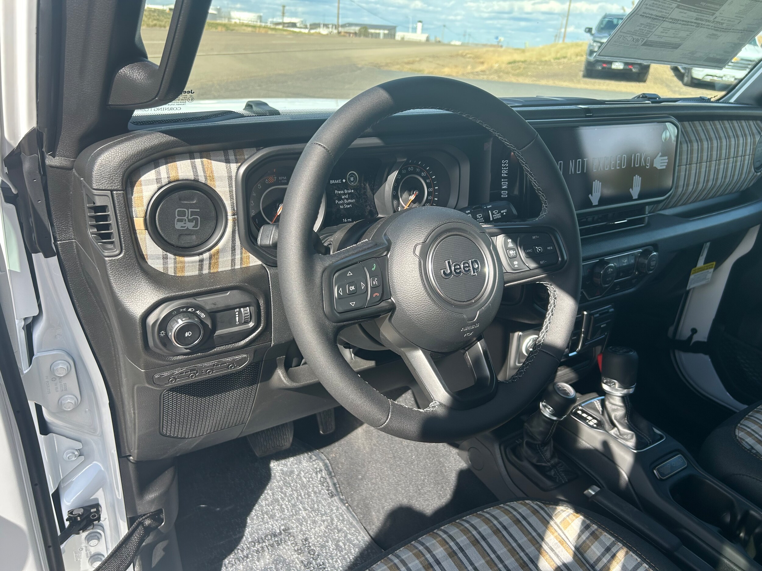 2026 Jeep Wrangler 4-DOOR 85TH ANNIVERSARY EDITION - Bright White Clear-Coat Paint exterior view 9