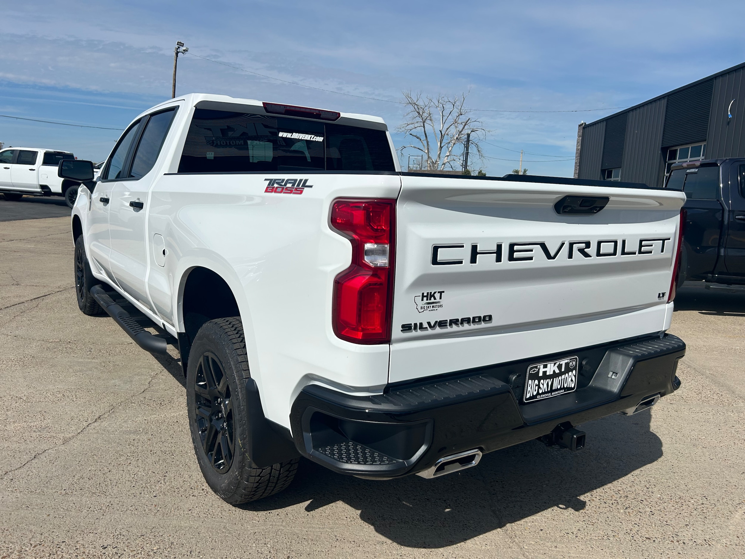 2026 Chevrolet Silverado 1500 LT Trail Boss - Summit White exterior view 4