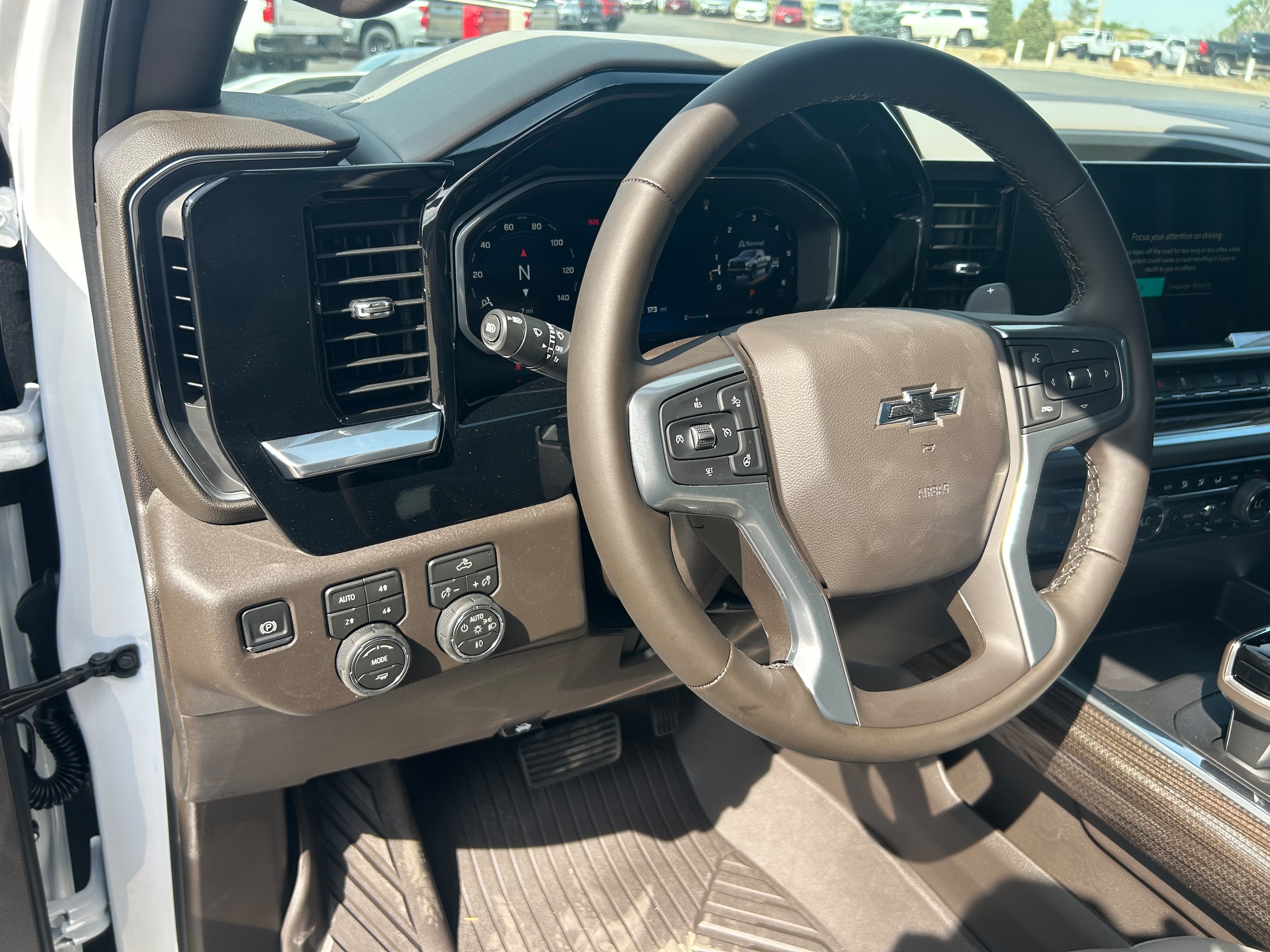 2026 Chevrolet Silverado 1500 LT Trail Boss - Summit White exterior view 9