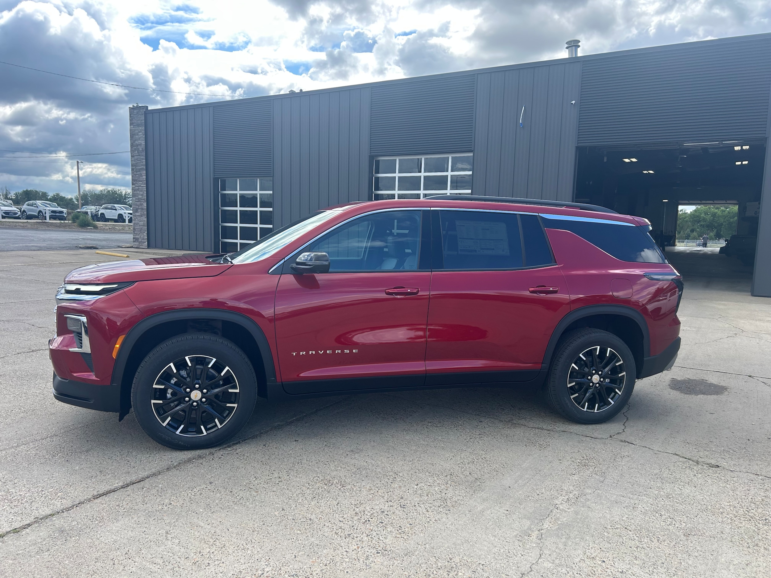 2026 Chevrolet Traverse LT - Radiant Red Tintcoat exterior view 3
