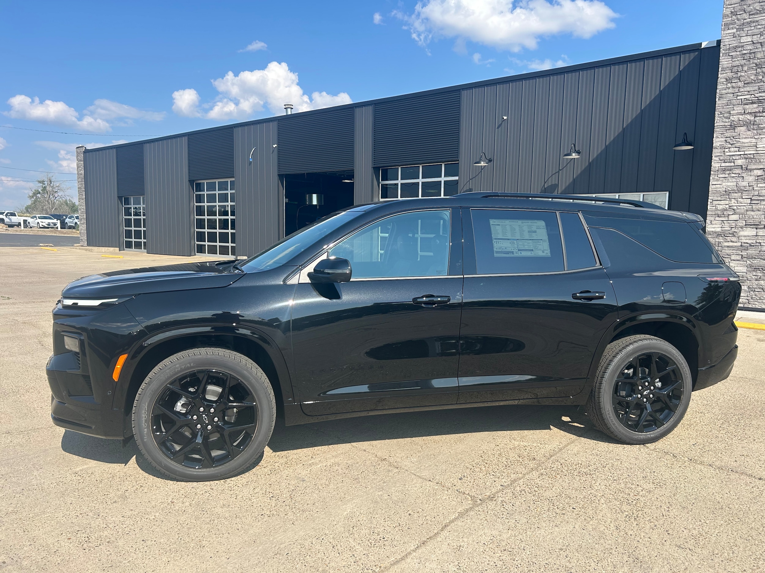2026 Chevrolet Traverse RS - Mosaic Black Metallic exterior view 3