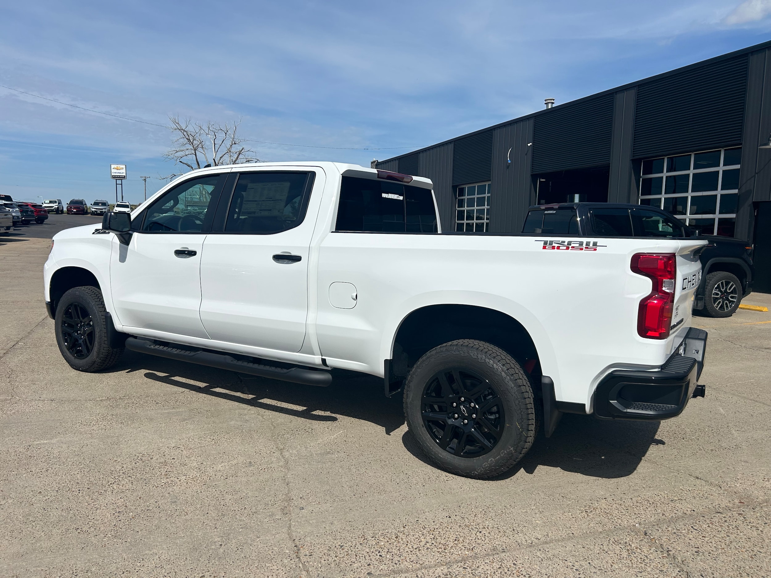 2026 Chevrolet Silverado 1500 LT Trail Boss - Summit White exterior view 6