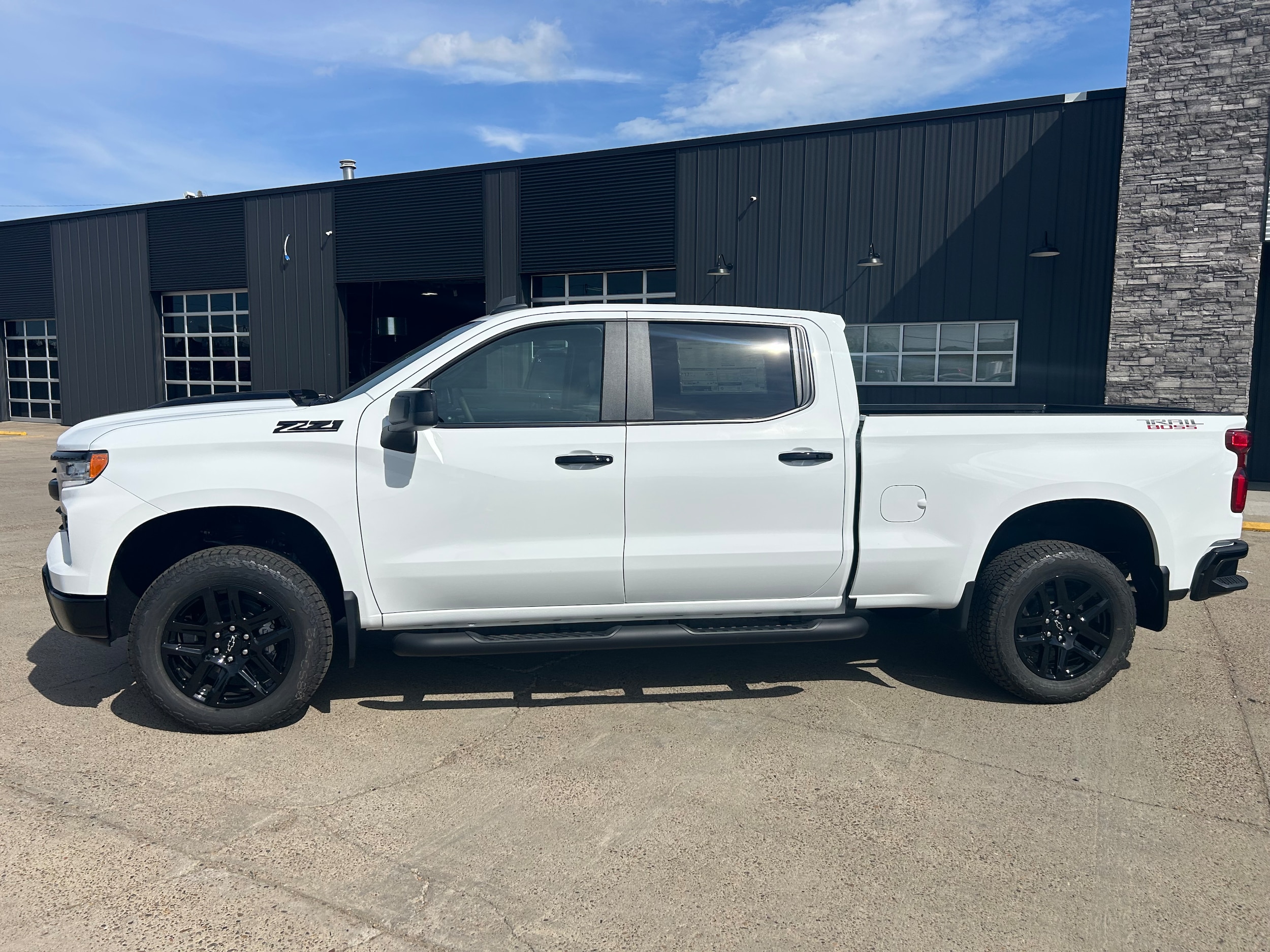 2026 Chevrolet Silverado 1500 LT Trail Boss - Summit White exterior view 3