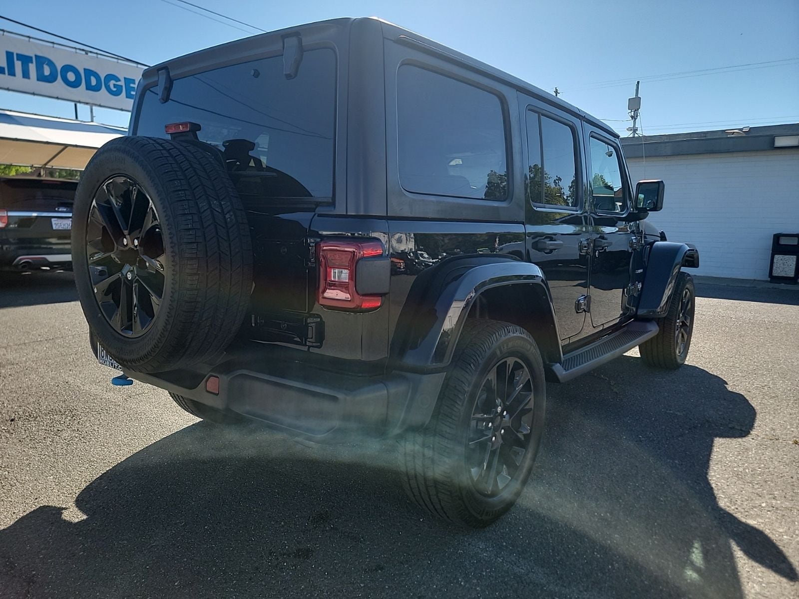 Used 2023 Jeep Wrangler 4xe Sahara with VIN 1C4JJXP66PW521669 for sale in Woodland, CA