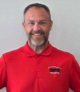 Staff member Adam St. John from ID_b762c1