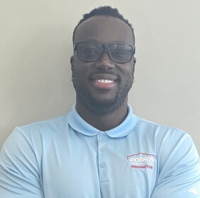 Staff member Moussa Gueye from ID_ba6b62