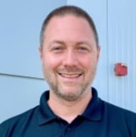 Staff member Brett Bush from ID_69e1c0cec9c9