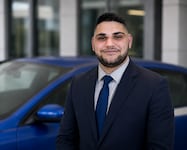 Staff member Alby Gashi from ID_a075bc5dc7ea