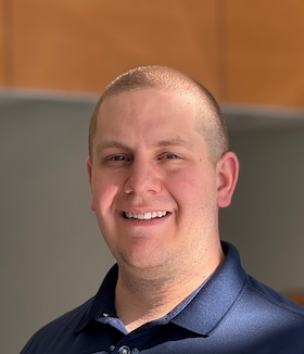 Staff member Tyler May from f4269fd4e185