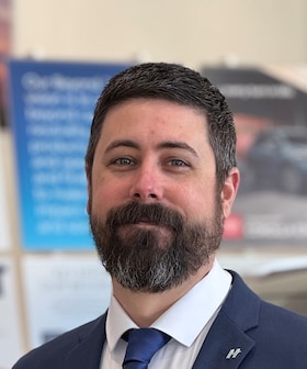 Staff member Timothy Bates from 3021aee6895a