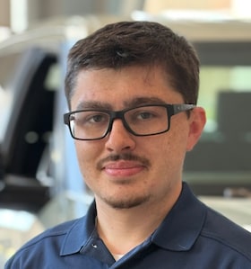 Staff member Charles Turnier from 682e15557181