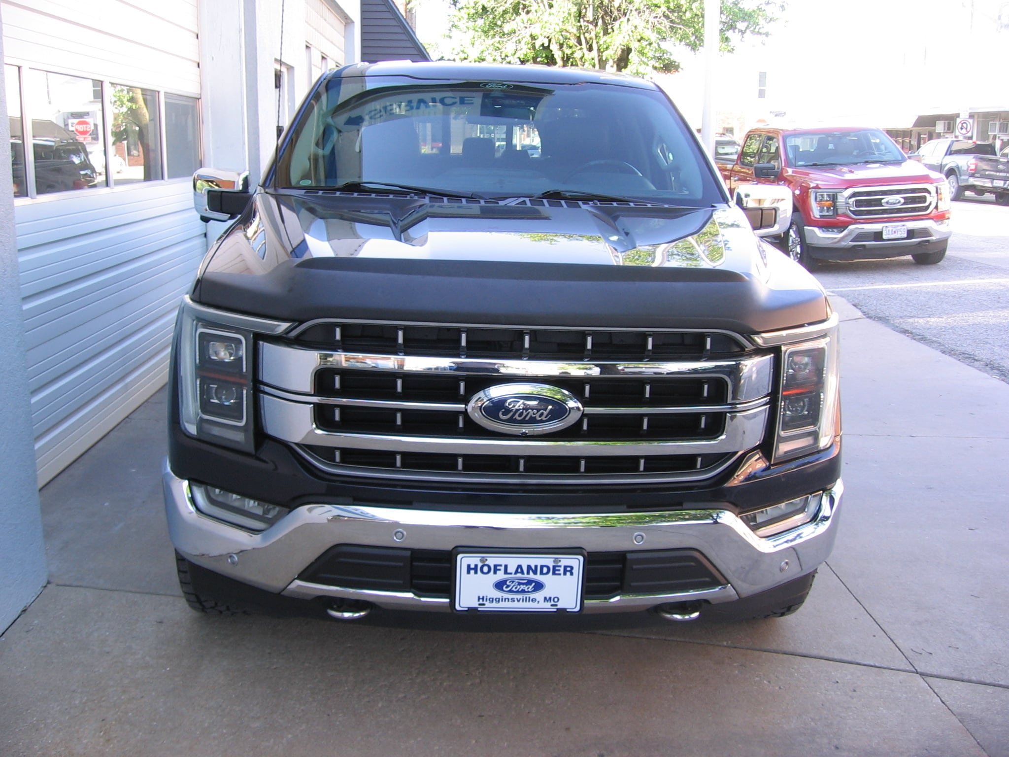 Used 2022 Ford F-150 Lariat with VIN 1FTFW1E51NFA28302 for sale in Kansas City
