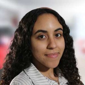 Staff member Leslie Baez  from ID_966fd0654399