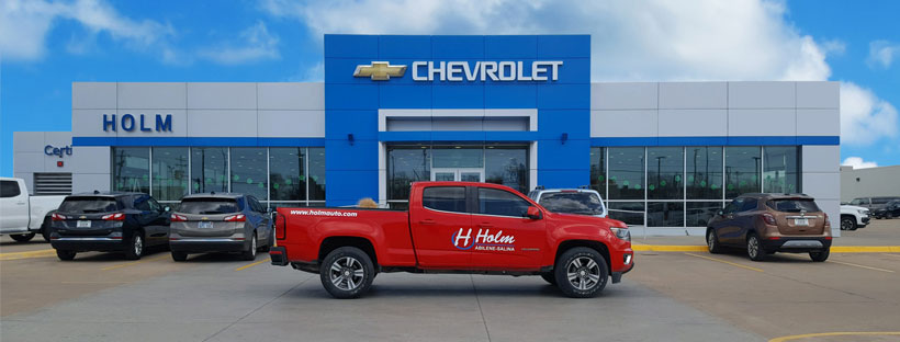  Holm Auto Center Storefront with truck