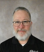 Staff member Gary Hasselman from ID_33f0e6