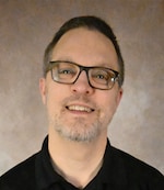 Staff member Brad Signer from ID_d6b602